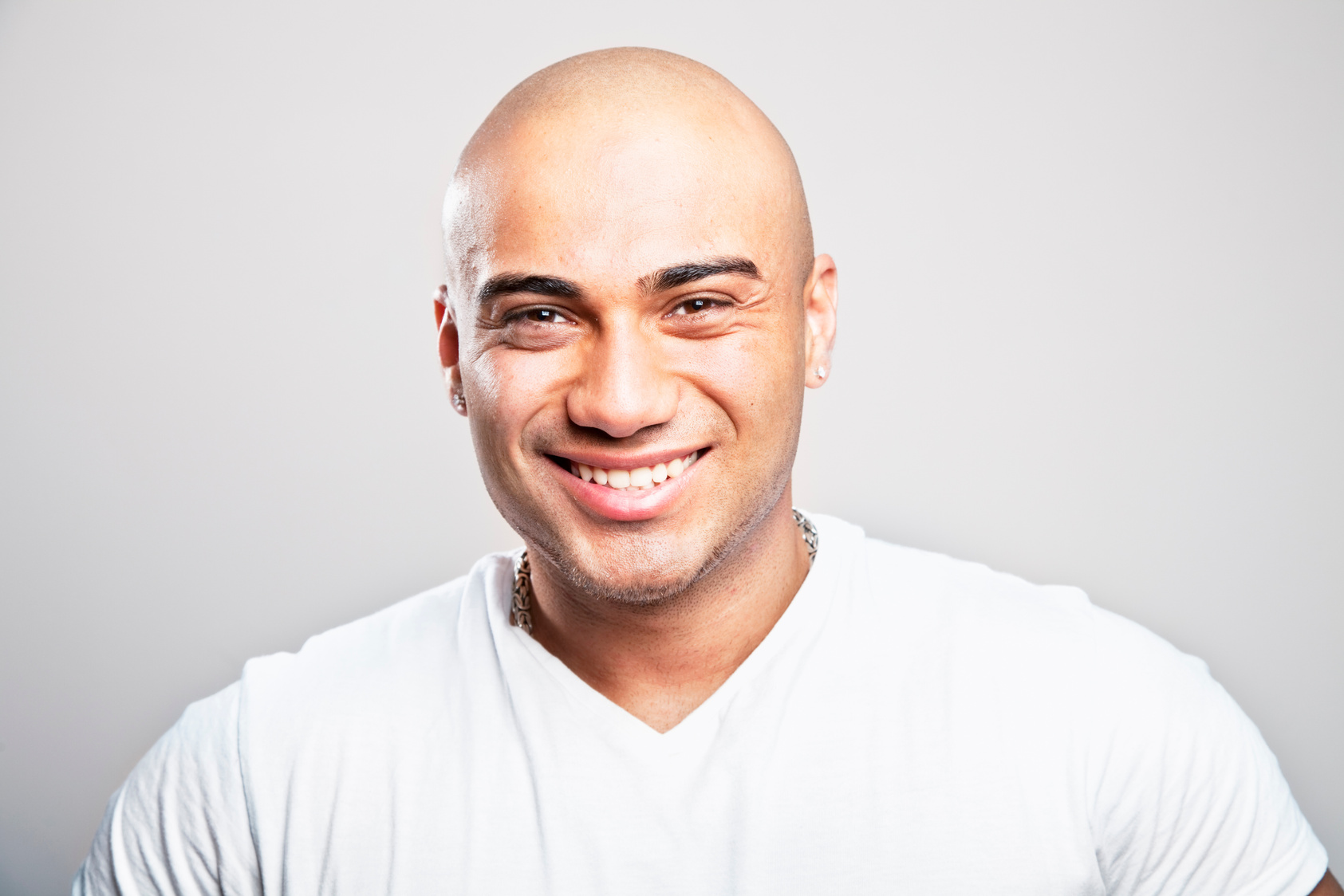 young man shaved head
